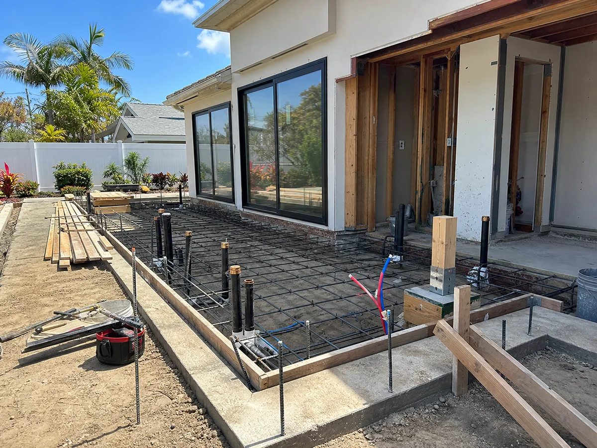 Kimmel Elite Construction San Diego remodel rough-in with concrete prep, rebar, utility sleeves, and inspection-ready construction details